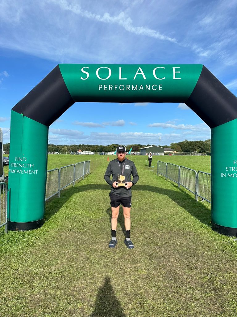 Finish line photo of my win at the Solace backyard ultra